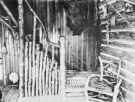 THE RUSTIC STAIRWAY IN THE CABIN