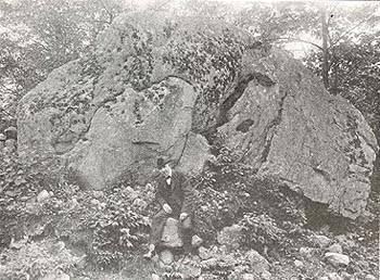 MR. BLICKENSDERFER BY HIS HUGE, LICHEN DOTTED BOULDER