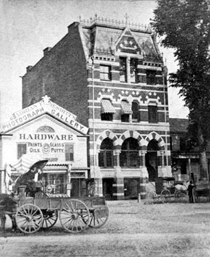 First National Bank Building and Nesbitt's Photograph Gallery on Atlantic Square, circa 1879