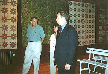 from right: Mayor Dannel P. Malloy, Interim Director Julie Chase, Quilt Dealer David Hupert