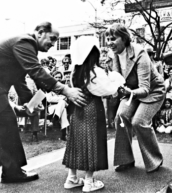 tGovernor Grasso being greated by child in costume